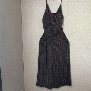 Jennifer Lopez Black and Gold Maxi Dress